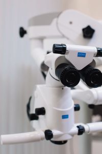 Detailed image of a professional optical microscope used in medical research.